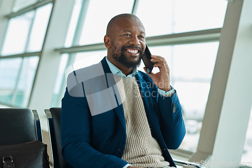 Image of Black man, phone call and smile at airport for business travel, trip or communication waiting for flight. Happy African American male smile in conversation or discussion on smartphone for traveling