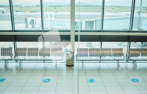 Image of Empty airport, chair or furniture in departure lounge, covid compliance or coronavirus lockdown in global healthcare laws. Air travel, seats or waiting area and nobody in bacteria control management