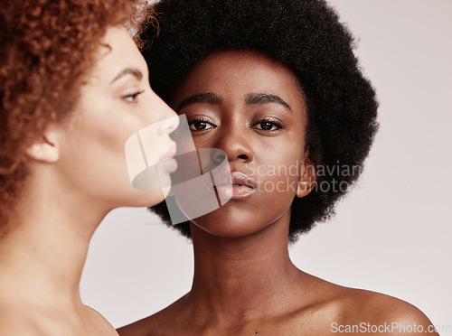 Image of Portrait, beauty and diversity with a black woman model in studio on a gray background for skincare. Luxury, wellness or cosmetics and an attractive young female posing indoor with a confident friend