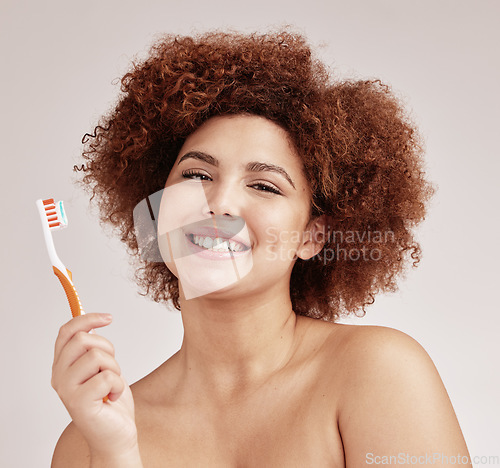 Image of Black woman, toothbrush and studio portrait for mouth health, cleaning and hygiene by background. Happy gen z model, brushing teeth and smile for beauty, wellness or self care with dental toothpaste