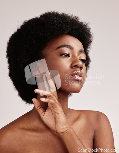 Image of Beauty, skincare and face of a black woman in studio with dermatology, makeup and cosmetics. Aesthetic model on studio background for hair, self love and facial skin natural glow for spa wellness