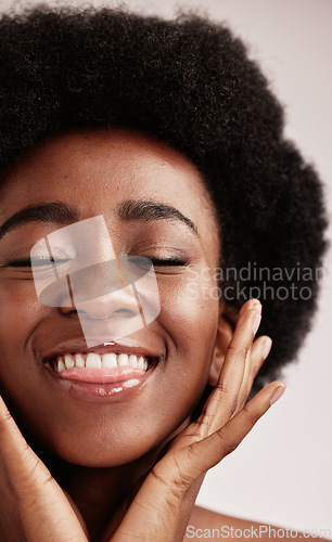 Image of Cosmetics, black woman and funny face with skincare, dermatology and girl on grey studio background. African American female, lady and makeup for morning routine, salon treatment luxury for grooming