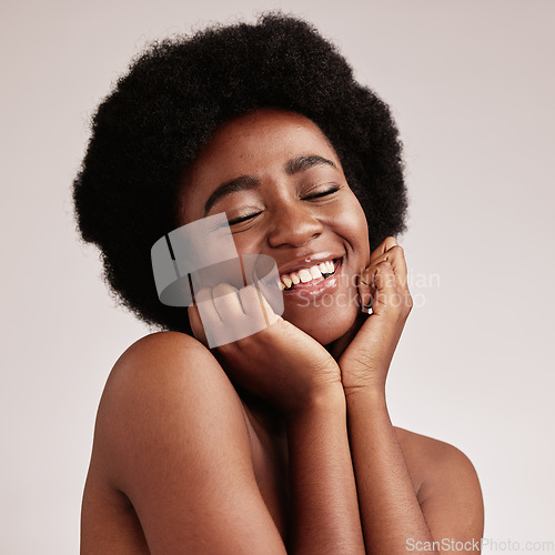 Image of Skincare, beauty and face of black woman in studio happy with dermatology, cosmetic and makeup. Aesthetic model with hands on natural facial skin for self love, health and wellness for spa background