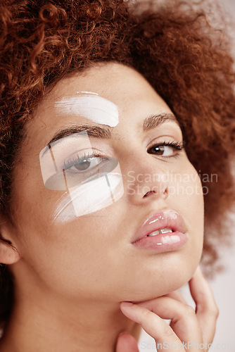 Image of Facial cream, zoom and portrait of a woman with beauty, dermatology and face lotion. Sunscreen, wellness and skincare moisturizer in a isolated studio with a model with skin glow and self care