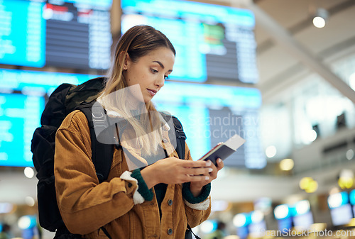 Image of Travel, passport and woman with phone at airport lobby for.social media, internet browsing or web scrolling. Vacation, mobile technology and female with smartphone and ticket for global traveling.