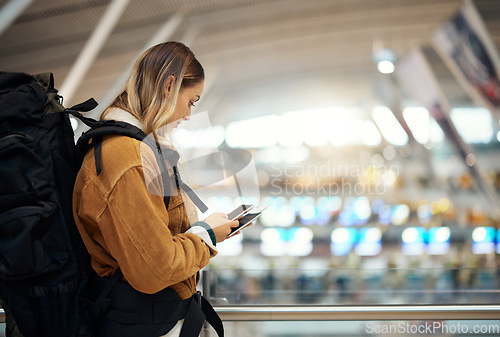 Image of Passport, travel and woman with phone at airport lobby for.social media, internet browsing or web scrolling. Vacation, mobile technology and female with smartphone and ticket for global traveling.