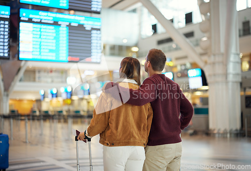 Image of Couple at airport, travel and flight time with holiday overseas, .adventure and love with romantic getaway. Man, woman and hug, international flight for vacation and bonding, ready to board airplane