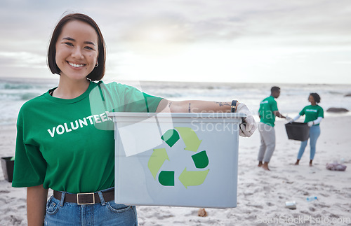 Image of Cleaning, recycle and portrait of asian woman at beach for plastic, environment or earth day. Recycling, sustainability and climate change with volunteer and trash for pollution and eco friendly