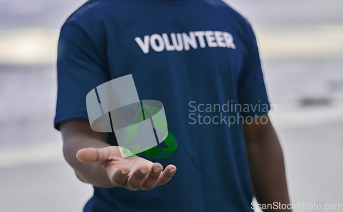 Image of Volunteer, hand and recycle sign with hologram, carbon footprint and save the earth with awareness. Black man, male and guy with holograph, community and eco friendly with reduce, reuse and pollution