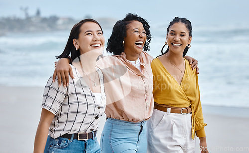 Image of Friends, diversity and beach, hug and walk while laughing, relax and talking against nature background. Travel, women and group embrace while walking at the sea, happy and smile on ocean trip in Bali