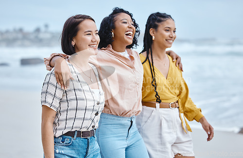 Image of Beach, diversity and friends, hug and walk while laughing, relax and talking against nature background. Travel, women and group embrace while walking at the sea, happy and smile on ocean trip in Bali