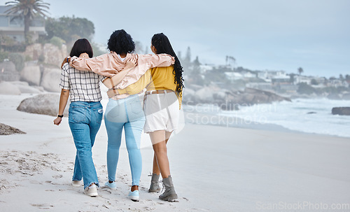 Image of Beach, hug or friends walking to relax on holiday vacation while talking or bonding in nature together. Back view, trust or group of women relaxing at sea enjoy traveling on fun ocean trips in Miami