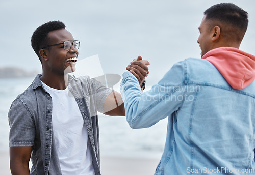 Image of Friends, handshake and greet at a beach while on vacation, holiday or trip, happy and excited on mockup background. Men, shaking hands and people smile and reunion at the sea on ocean trip in Bali