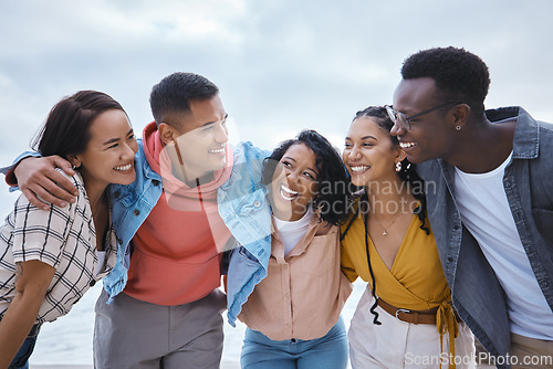 Image of Diversity, hug and friends at a beach, happy and smile while bonding in nature on mockup background. Embrace, men and women outdoor for travel, reunion or weekend trip, joy or cheerful on copy space