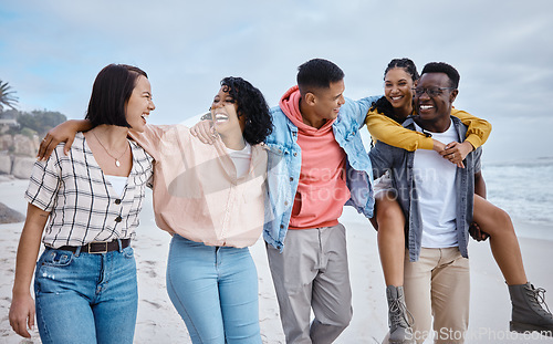 Image of Friends, group and smile at beach, ocean and outdoor nature for fun, happiness and travel. Diversity of happy young people at sea for holiday, vacation and social gathering, weekend or relax together