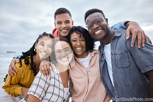 Image of Friends, diversity and portrait at beach, ocean and outdoor nature for fun, happiness and travel. Group of happy young people at sea for holiday, vacation and smile for relaxing weekend trip together