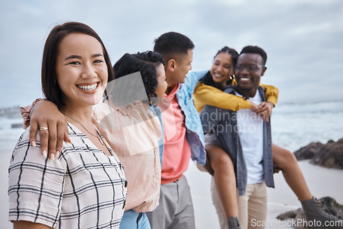 Image of Asian woman, portrait and smile of friends at beach, ocean and outdoor nature for fun, happiness and travel. Diversity of happy young people at sea for holiday, vacation and relaxing weekend together