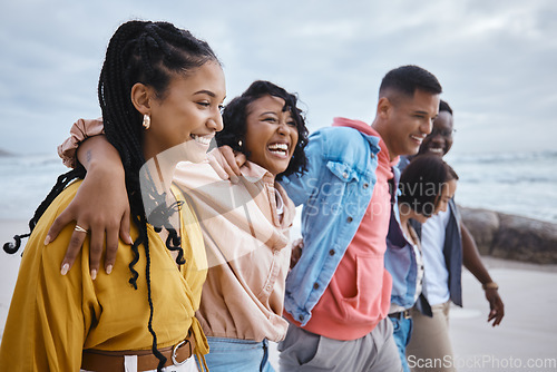 Image of Diversity, hug and friends walking at the beach for holiday, vacation and bonding on nature background. Men, happy and women group relax at the sea, laugh and cheerful on an ocean trip in Miami