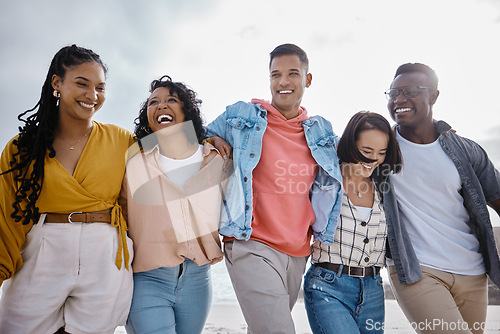 Image of Happy, friends and walking at the beach for holiday, diversity and vacation while bonding on sky background. Men, smile and women group relax at the sea, laugh and cheerful on an ocean trip in Miami