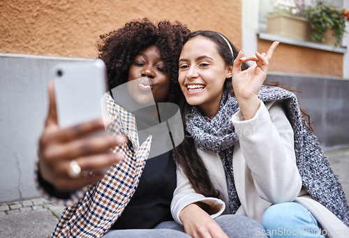 Image of Woman, friends and selfie in the city for profile picture, friendship memory or social media influencer. Happy women smile for photo, online post or vlog in travel, journey or trip in a urban town