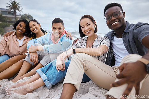 Image of Friends, group and portrait at beach, sand and outdoor nature for fun, happiness and travel. Diversity of happy young people at sea, ocean holiday and vacation with smile of relaxing weekend together