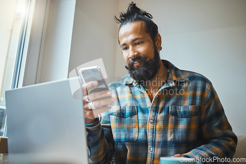 Image of Remote work, phone or cafe man on laptop planning on web store networking, social media or B2B sale. Small business or startup on smartphone for communication, networking or research in restaurant