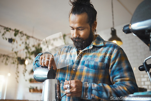 Image of Barista in cafe, latte art and process with man, working and design with milk foam and espresso. Small business, production and workflow, service and creative with focus and artistic in coffee shop