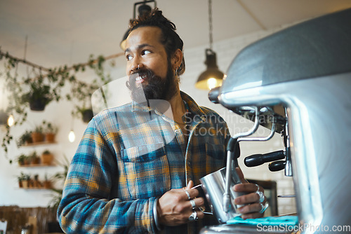 Image of Cafe, startup and waiter with a man barista behind the counter to prepare a drink. Coffee shop, kitchen and service with a male working in a restaurant as an entrepreneur or small business owner