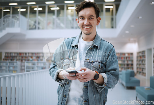 Image of University, portrait smile or man with phone in library for research, communication or blog news. Book, education or happy student on smartphone for scholarship networking, website or online content