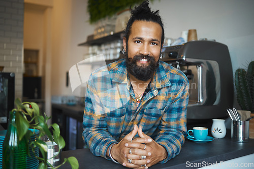 Image of Indian man, portrait and coffee shop owner at small business ready for work with a smile. Happy, cafe and restaurant barista feeling proud of waiter service and boss management at professional job