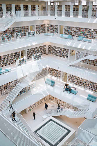 Image of Library, university and education building with books for college students ready for learning. Architecture, study research and school book on campus for knowledge and studying with textbooks