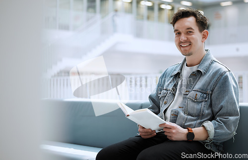 Image of Reading, books and happy man in library for university, college or research in portrait of philosophy scholarship. Student with English language, education or knowledge on history studying in college