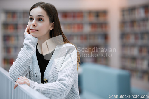 Image of University, thinking and student in library for books, knowledge and academic research for course. Education, college and young woman with ideas, vision and success mindset for future career goals