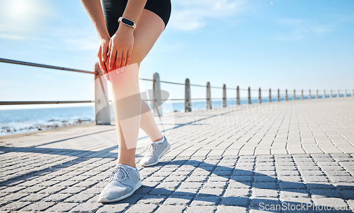 Image of Sports athlete, knee pain or red glow by beach fitness, ocean workout or sea training in healthcare wellness crisis. Legs injury, hurt or body stress for woman in abstract burnout on medical anatomy