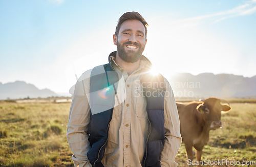 Image of Smile, farming and portrait of man with cow on field, happy farmer in countryside with dairy and beef production. Nature, meat and eco milk farm, sustainability and small business in food industry.