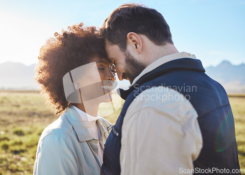 Image of Happy, smile and love with couple on farm for agriculture, peace and growth. Teamwork, bonding and hug with man and woman in grass field of countryside for sustainability, health and environment