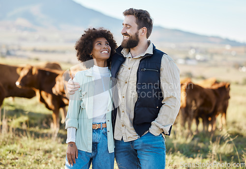 Image of Happy, cow and love with couple on farm for agriculture, nature and growth. Teamwork, animals and hug with man and woman in grass field of countryside for sustainability, cattle and environment