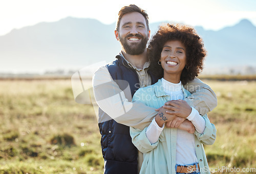 Image of Love, portrait and hug with interracial couple on farm for agriculture, mockup and growth. Teamwork, happy and nature with man and black woman in grass field for sustainability, agro and environment