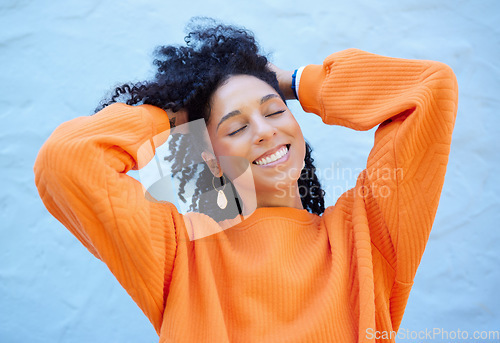 Image of Happy, fashion and face of black woman on blue background with smile, confident mindset and freedom. Happiness, beauty and girl relax in city with urban style, trendy and stylish clothes on weekend
