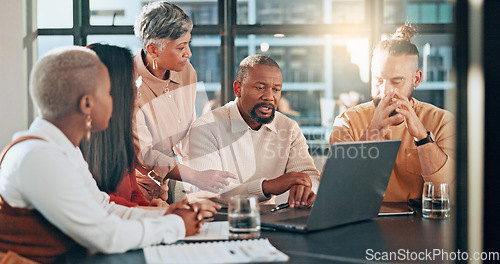 Image of Laptop, digital agency or business people in a meeting with leadership, team work or creative ideas. Problem solving, innovation or senior manager helping or speaking of a strategy plan to employees