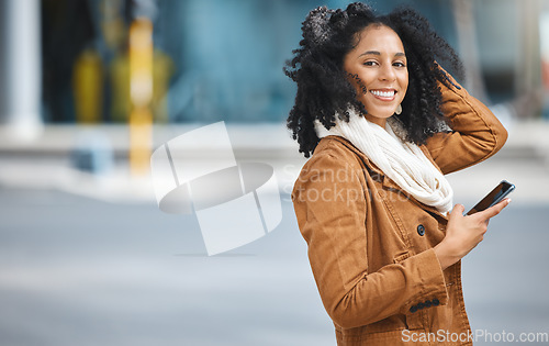 Image of Phone, city and portrait of black woman travel, communication and social media networking on way to work. Walking, 5g technology and winter fashion person on smartphone in urban city street or road