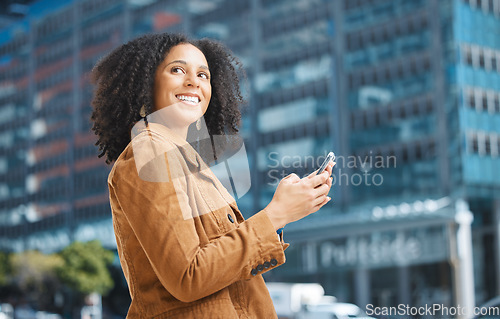 Image of Phone, city and thinking black woman for travel, communication or social media networking on way to work. Walking, 5g technology and young person ideas on smartphone, mobile or chat in urban street