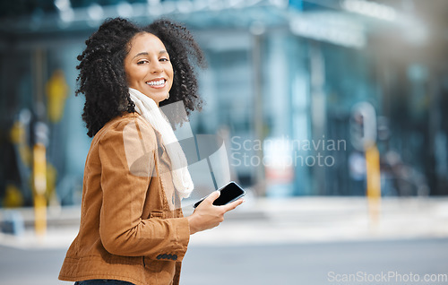 Image of City, portrait and and travel black woman on phone, communication or social media networking on mobile. Walking, 5g technology and winter fashion person on smartphone chat in urban street or road