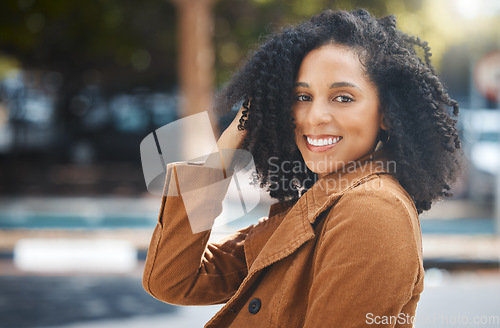 Image of Freedom, portrait and travel by black woman in city, happy and smile on vacation against urban background. Face, smile and tourist on holiday on New York, cheerful and relax downtown for fun or break