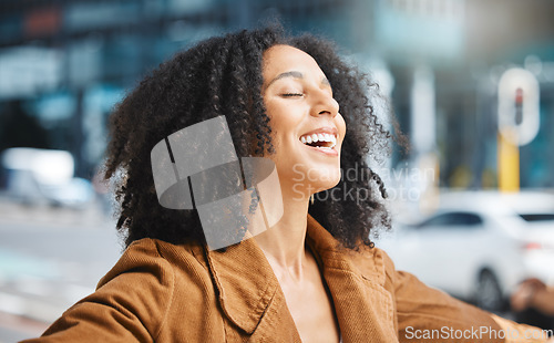 Image of Happy, freedom and black woman in a city for travel, vacation and holiday against an urban background. Smile, free and living girl in New York for break, explore and journey with happiness and mockup