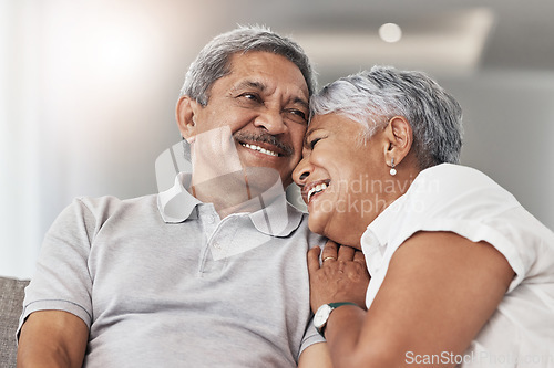 Image of Love, relax and senior couple laugh at funny joke, enjoy quality time together and bond on home living room sofa. Retirement, smile and elderly man, woman or people happy in Rio de Janeiro Brazil