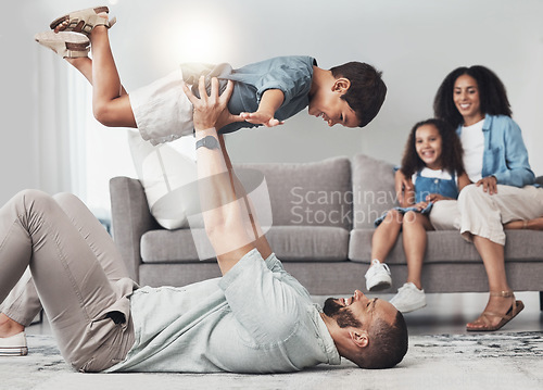 Image of Relax, happy and airplane with father and son on floor of living room for bonding, playful and support. Wellness, game and strong with dad and child in family home for care, quality time and smile