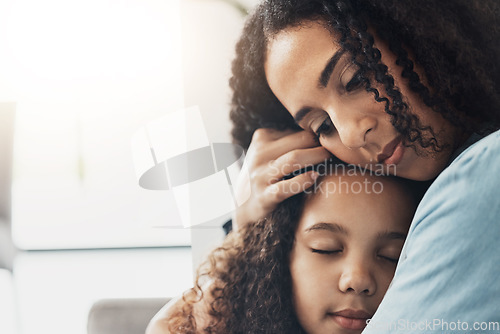 Image of Love, care and mother hug girl in home, bonding and caring for child while enjoying time together. Family, affection and mom or mama hugging, cuddle and embrace kid for support, trust and comfort.