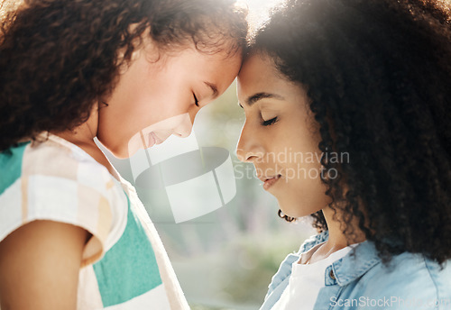 Image of Family, mother and child with love and peace outdoor, forehead touching with embrace, calm and content. Relationship, trust and support, black woman and girl, motherhood and parenting with connection