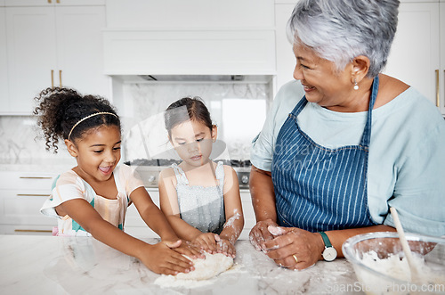 Image of Learning, cooking dough and grandmother with kids in kitchen baking dessert or pastry. Education, family care and happy grandma teaching sisters or children how to bake, bonding and laughing together